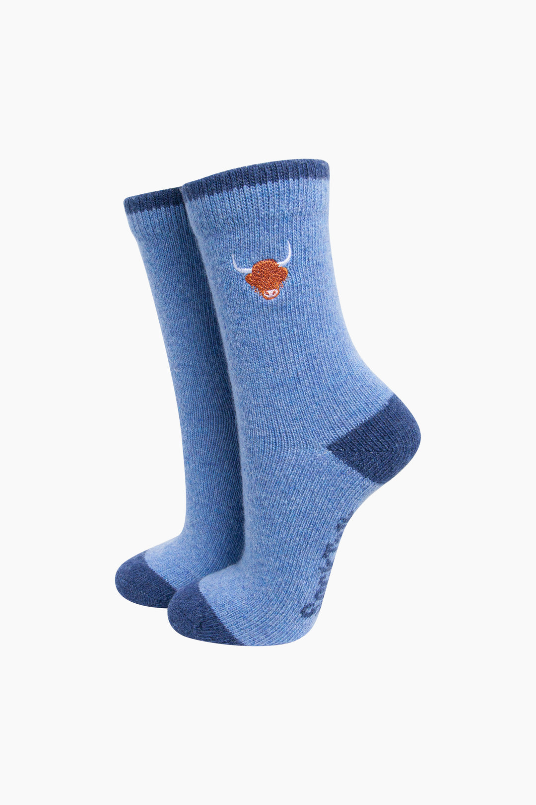 Highland-Cow-Embroidered-Wool-Socks-in-Denim-Blue-On-Mannequin