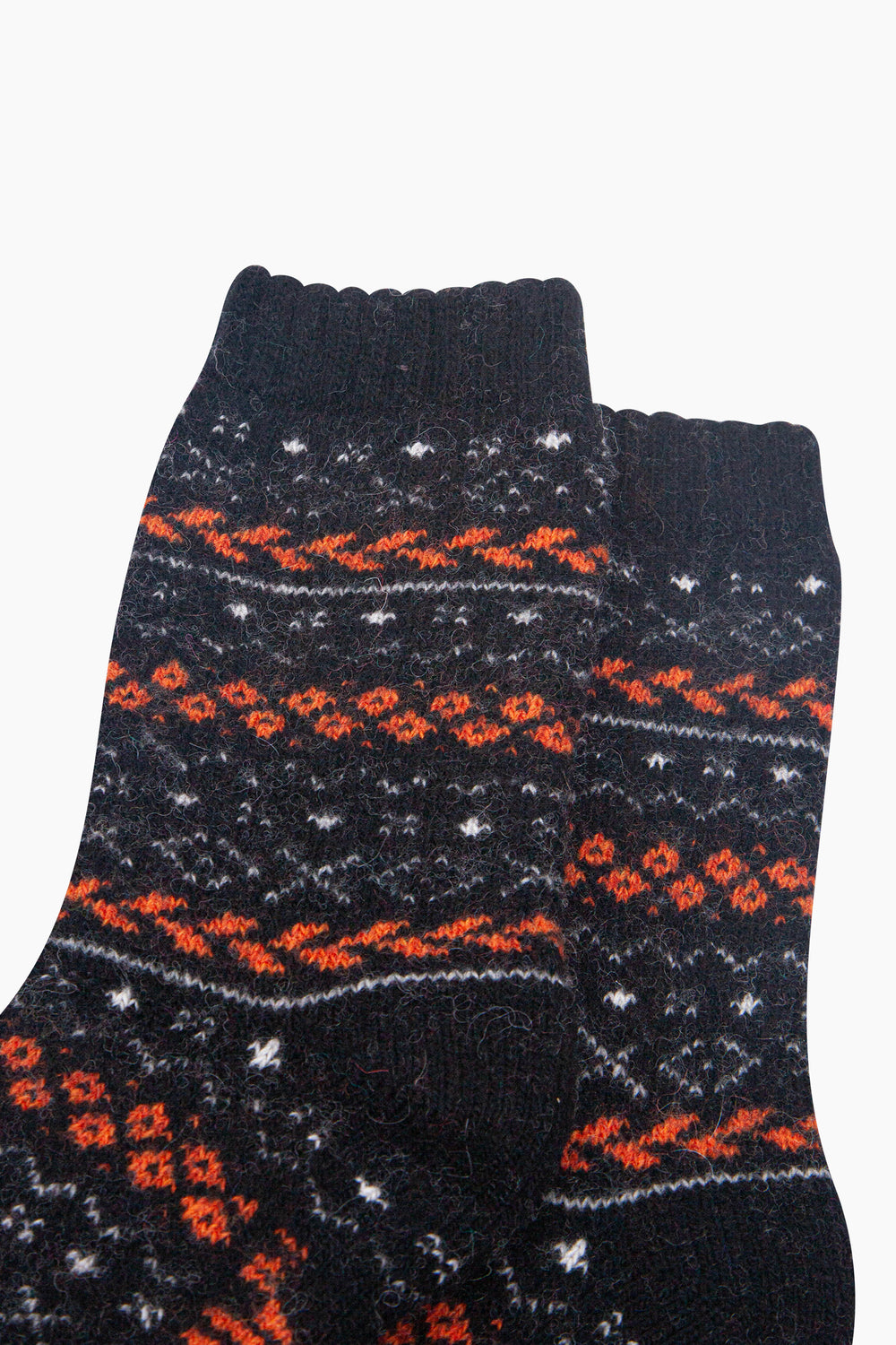 Fair-Isle-Patterned-Wool-Socks-in-Black/Orange-Close-Up