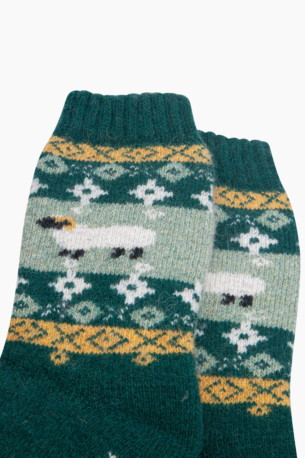 Sheep-Patterned-Wool-Socks-in-Green-Close-Up