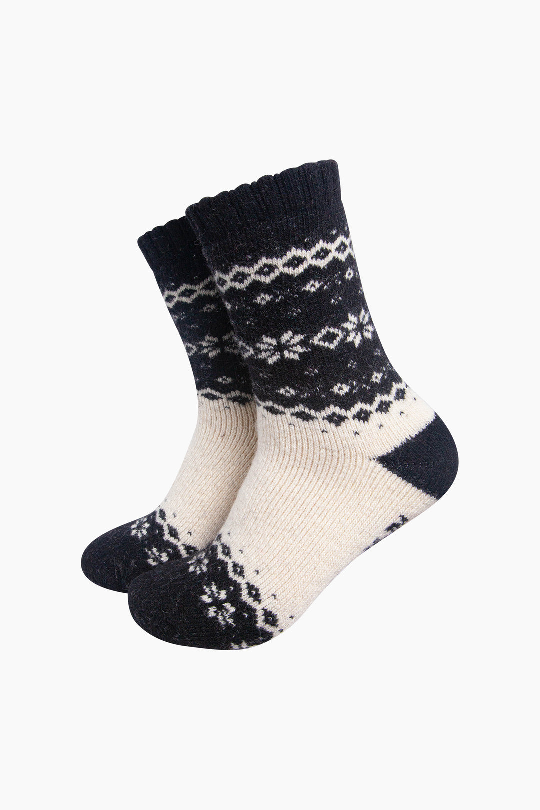 Nordic-Snowflake-Patterned-Wool-Socks-in-Black/Oat-On-Mannequin