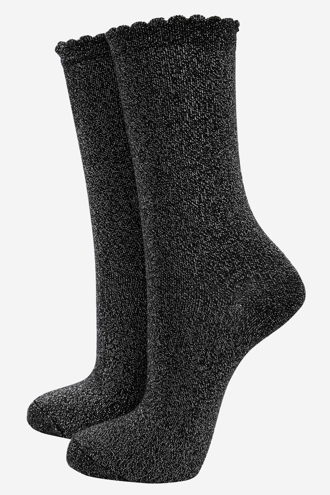 black socks with an all over bold silver glitter sparle, the socks have a soft scalloped cuff