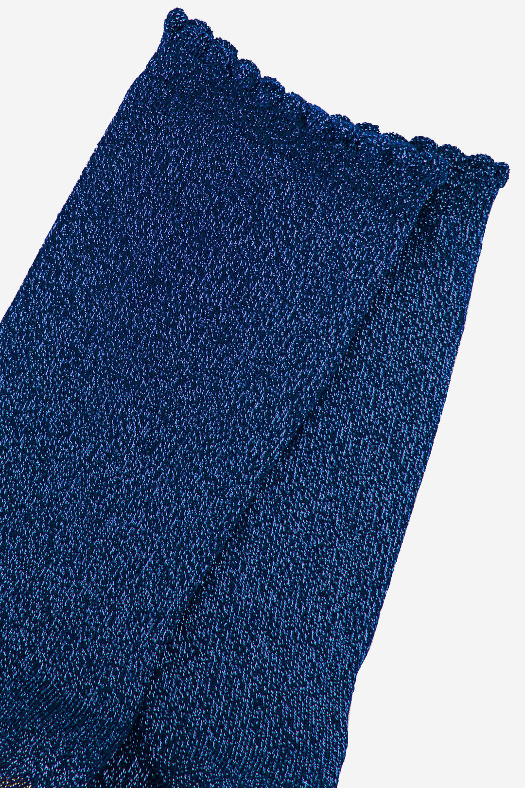 close up of the blue sparkly ankle socks showing the all over glitter effect of the material