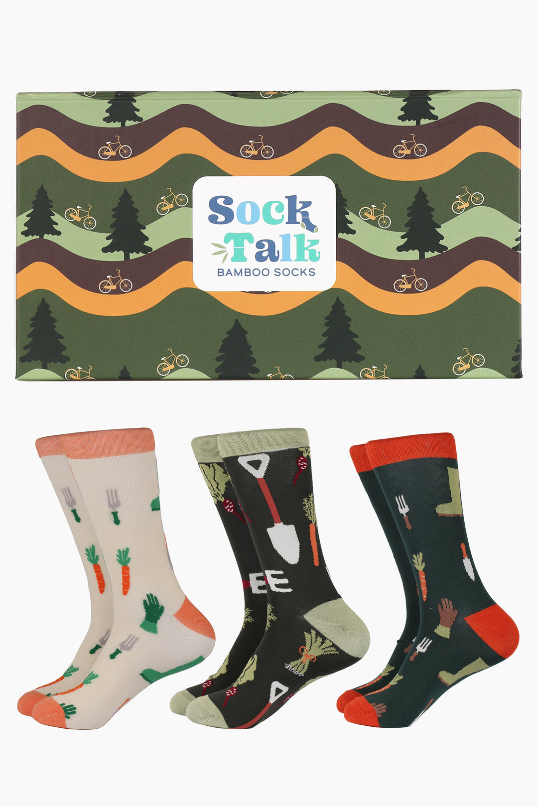 three pairs of gardening inspired bamboo socks in green and cream each featuring garden tools and plants, the gift box is green and features a forest scene with bikes and trees