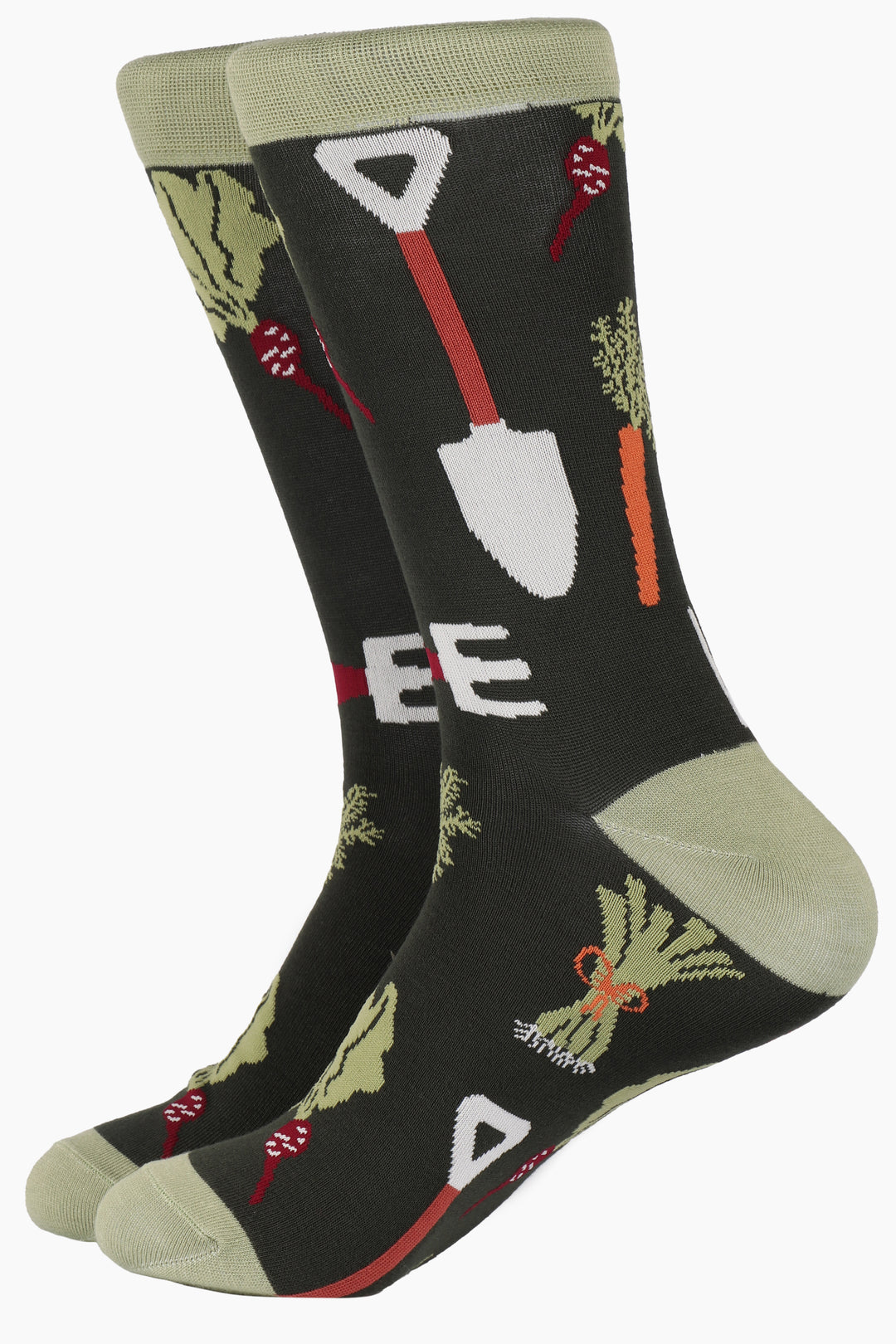 green bamboo socks with an green heel, toe and cuff with an all over pattern of garden spades, carrots and beets