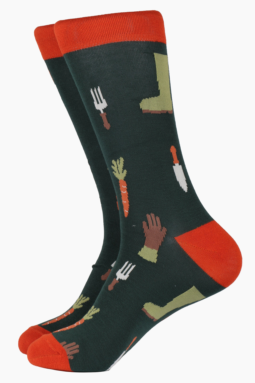 green bamboo socks with an orange heel, toe and cuff with an all over pattern of orange carrots, brown gardening gloves and garden tools