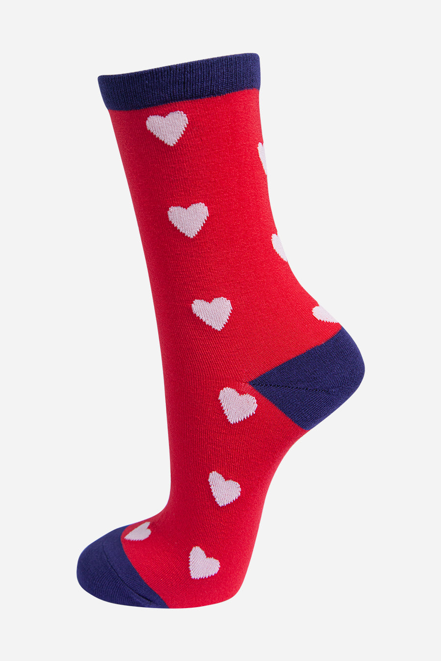 red bamboo socks with a navy blue heel, toe and cuff with an all over pink love heart pattern