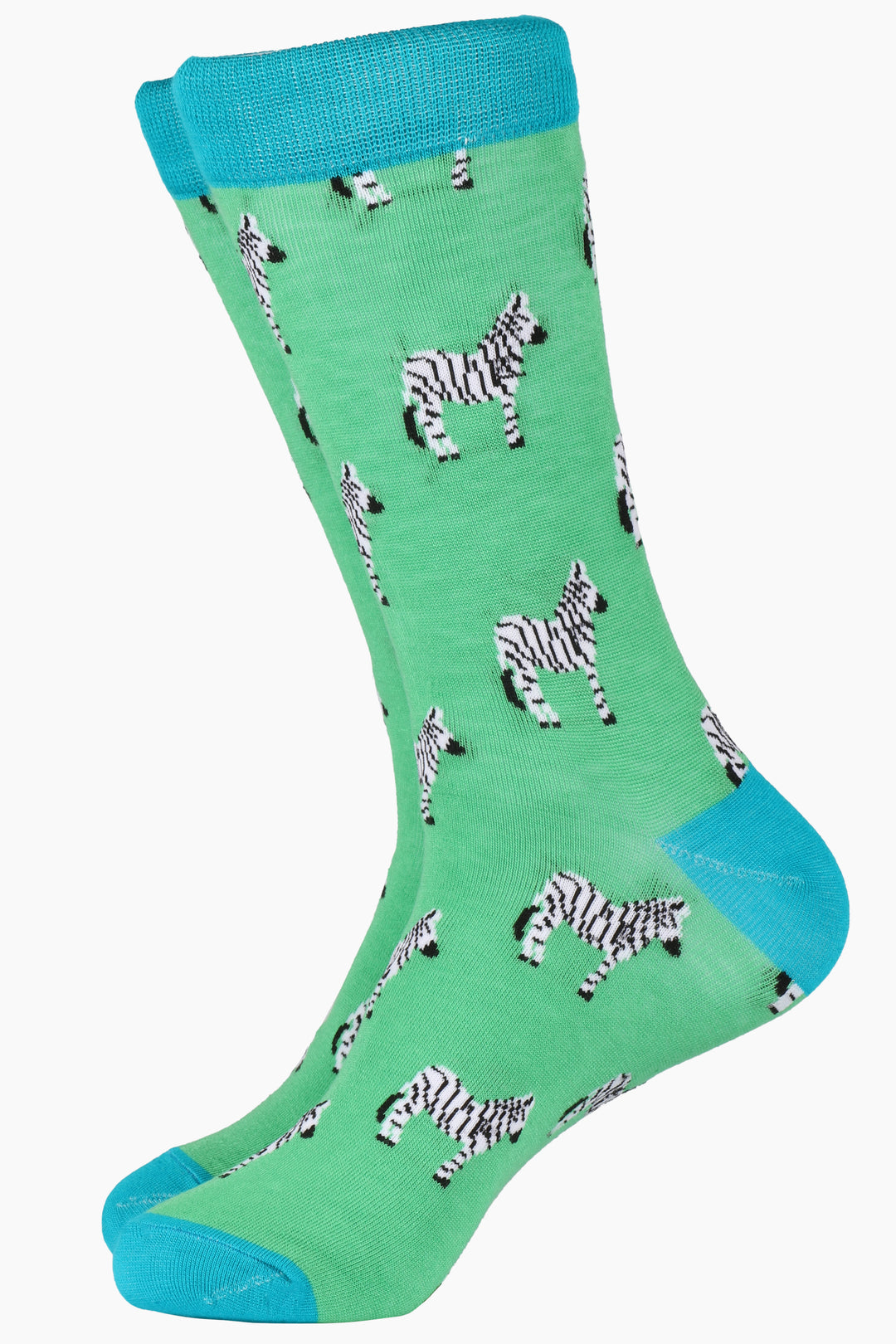 green bamboo socks with blue toe, heel and cuff with an all over pattern of black and white zebras
