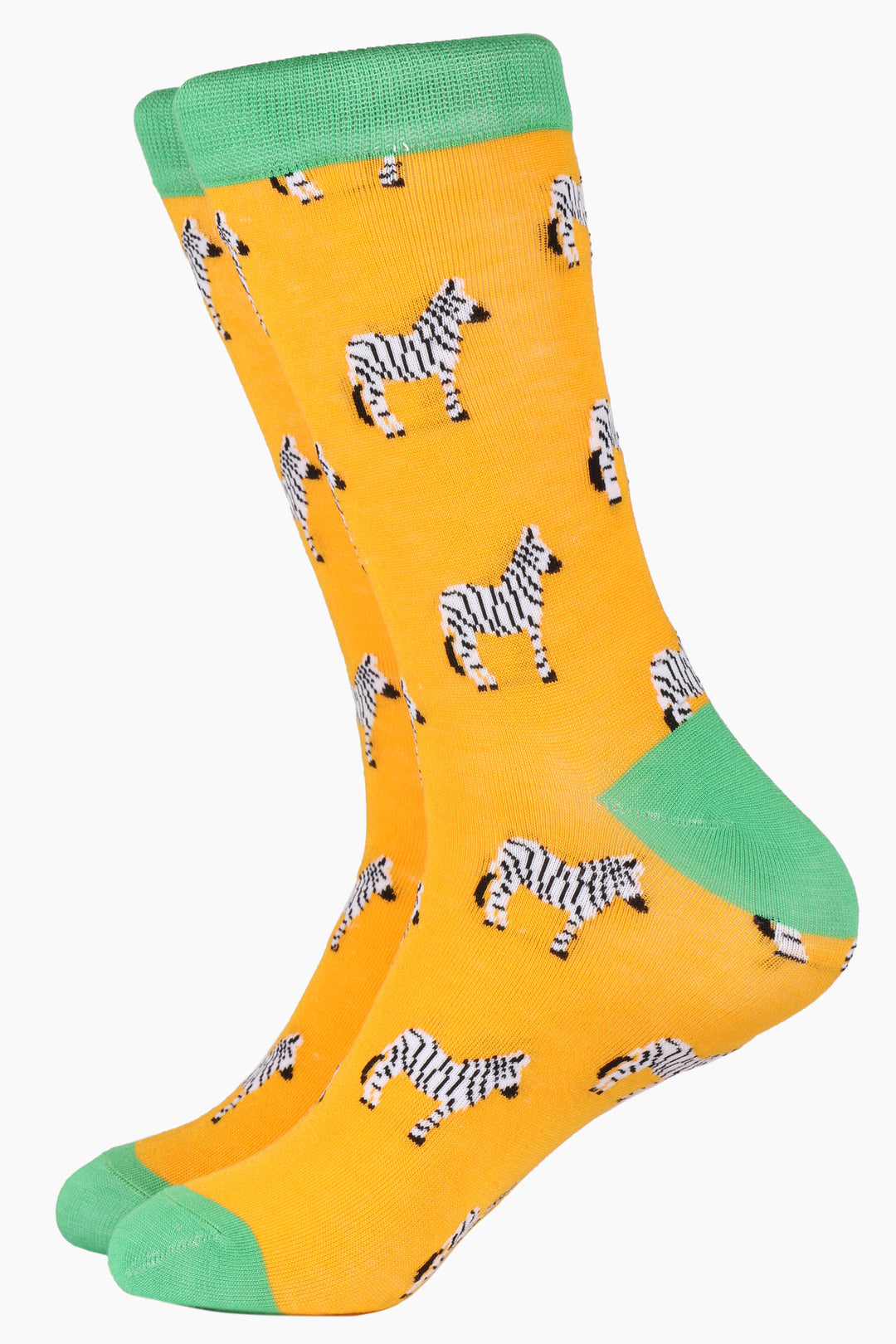 yellow bamboo socks with green toe, heel and cuff with an all over pattern of black and white zebras