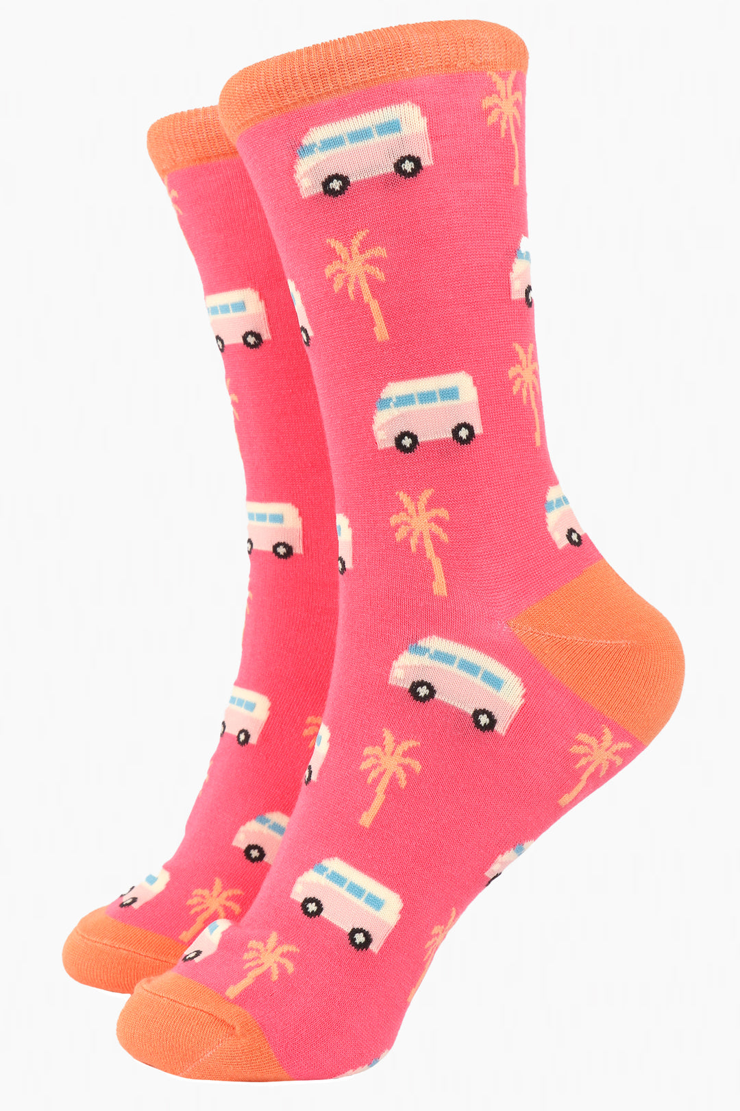 pink bamboo socks with coral heel, toe and cuff with an all over pattern of campervans and palm trees