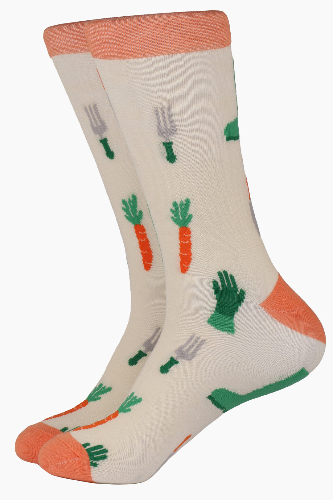 cream bamboo socks with an orange heel, toe and cuff with an all over pattern of orange carrots, green gardening gloves and garden tools