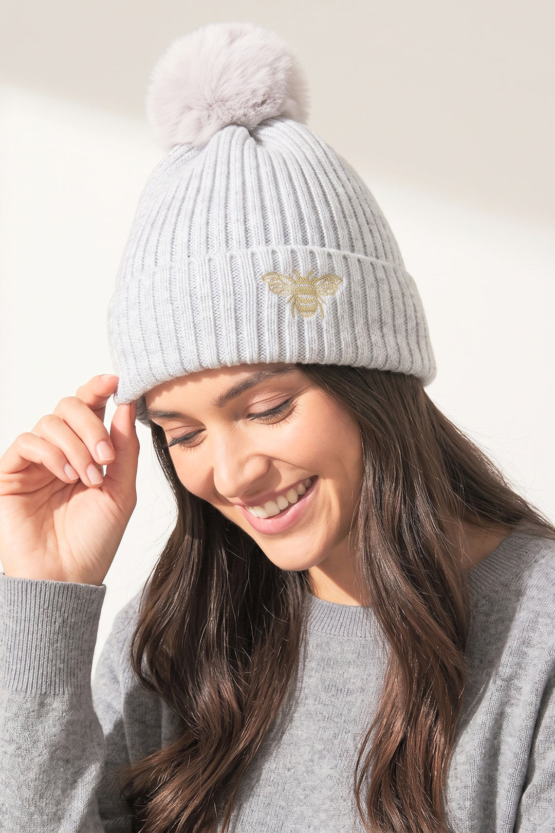light-grey-pom-pom-hat-embroidered-bee