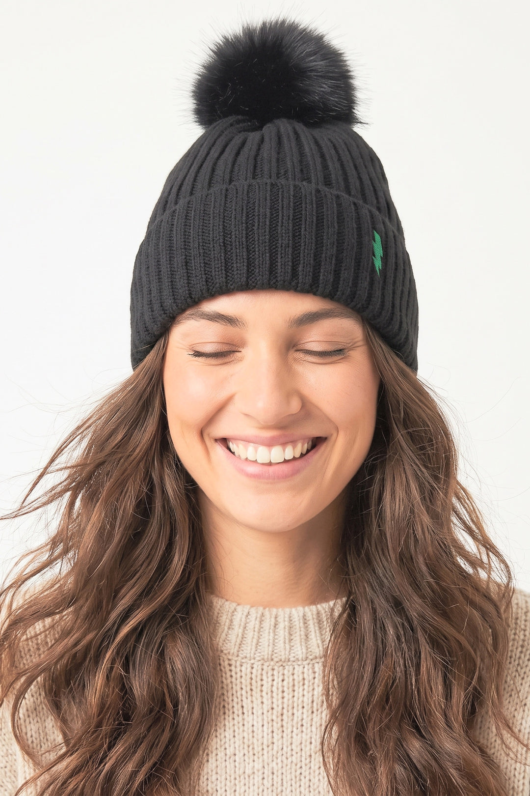 black-pom-pom-hat-green-lightning-bolt