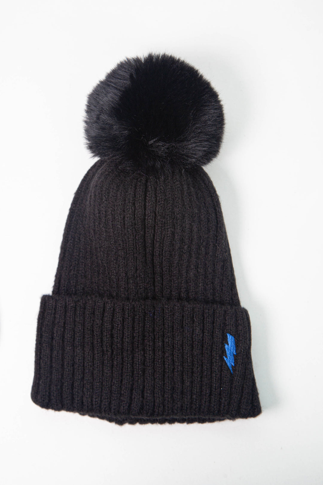 black ribbed beanie hat with a pom pom on top and a blue embroidered lightning bolt motif on the cuff of the hat
