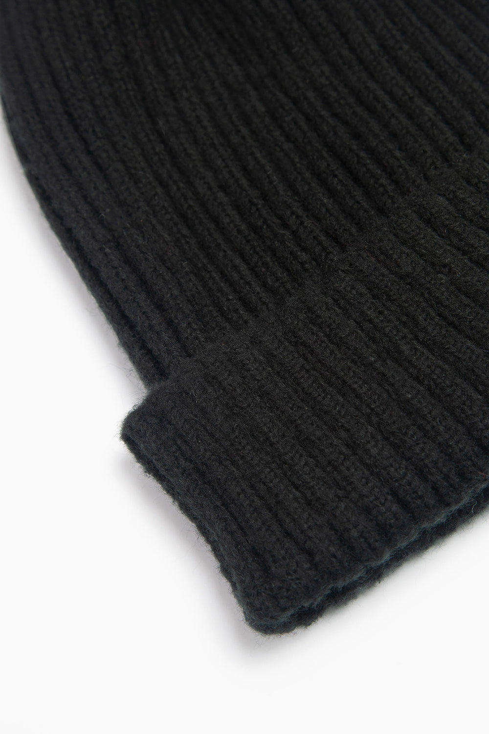 close up of the ribbed material of this beanie hat