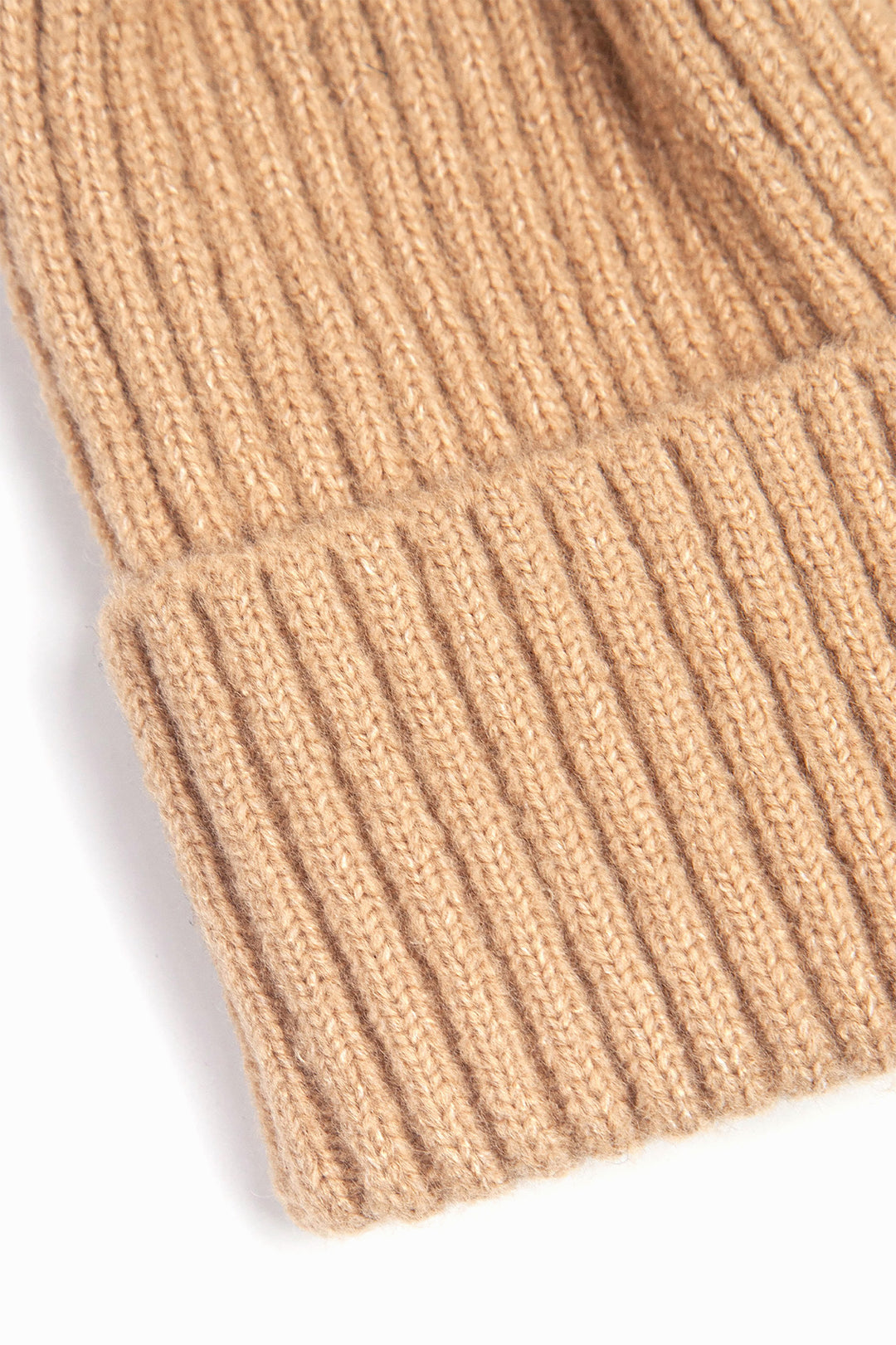 close up of the ribbed material of the beanie hat