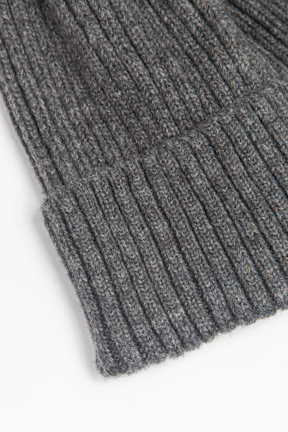 close up of the ribbed material of the beanie hat