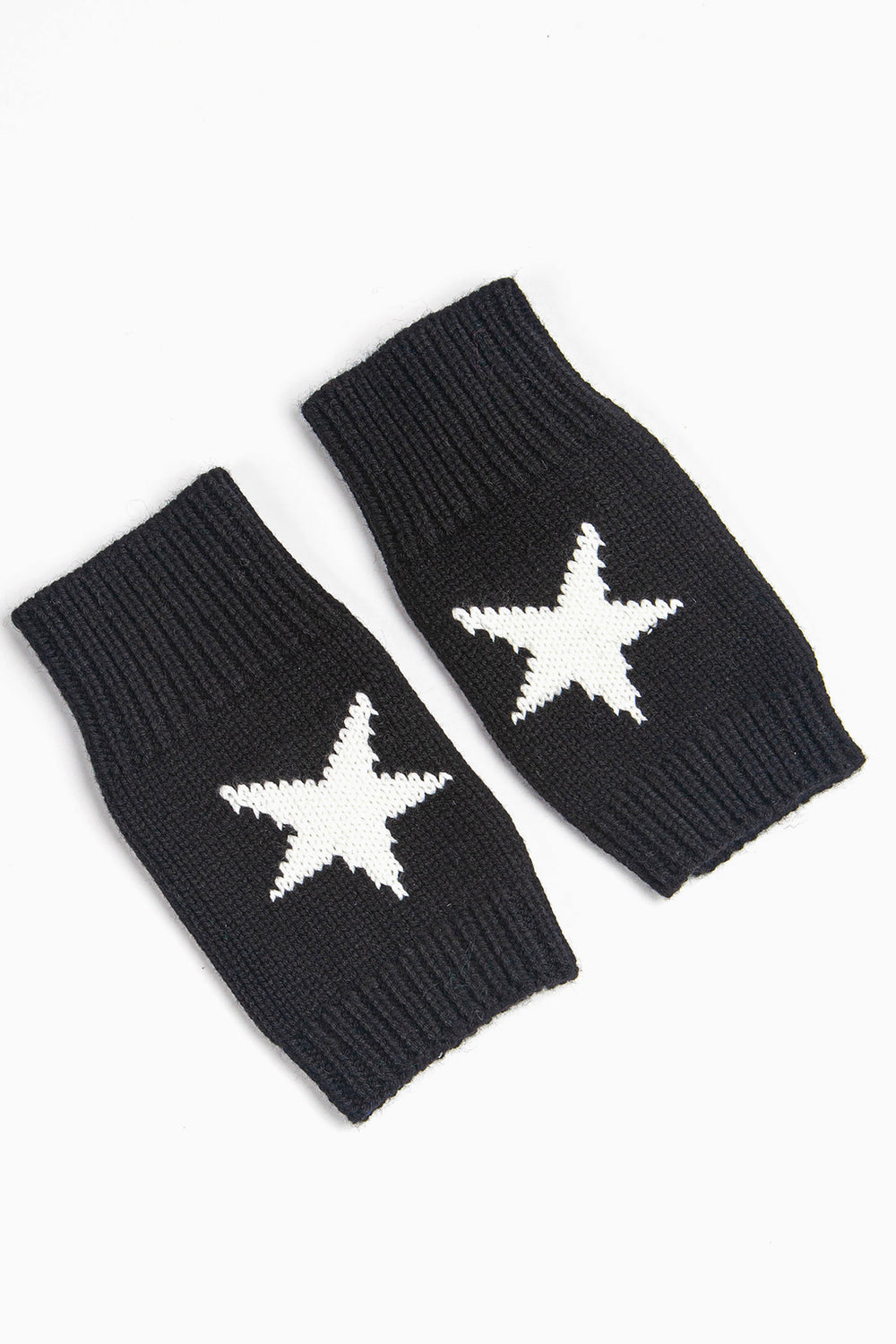 black knitted wrist warmers with a white knitted single large star on the back of the hand.