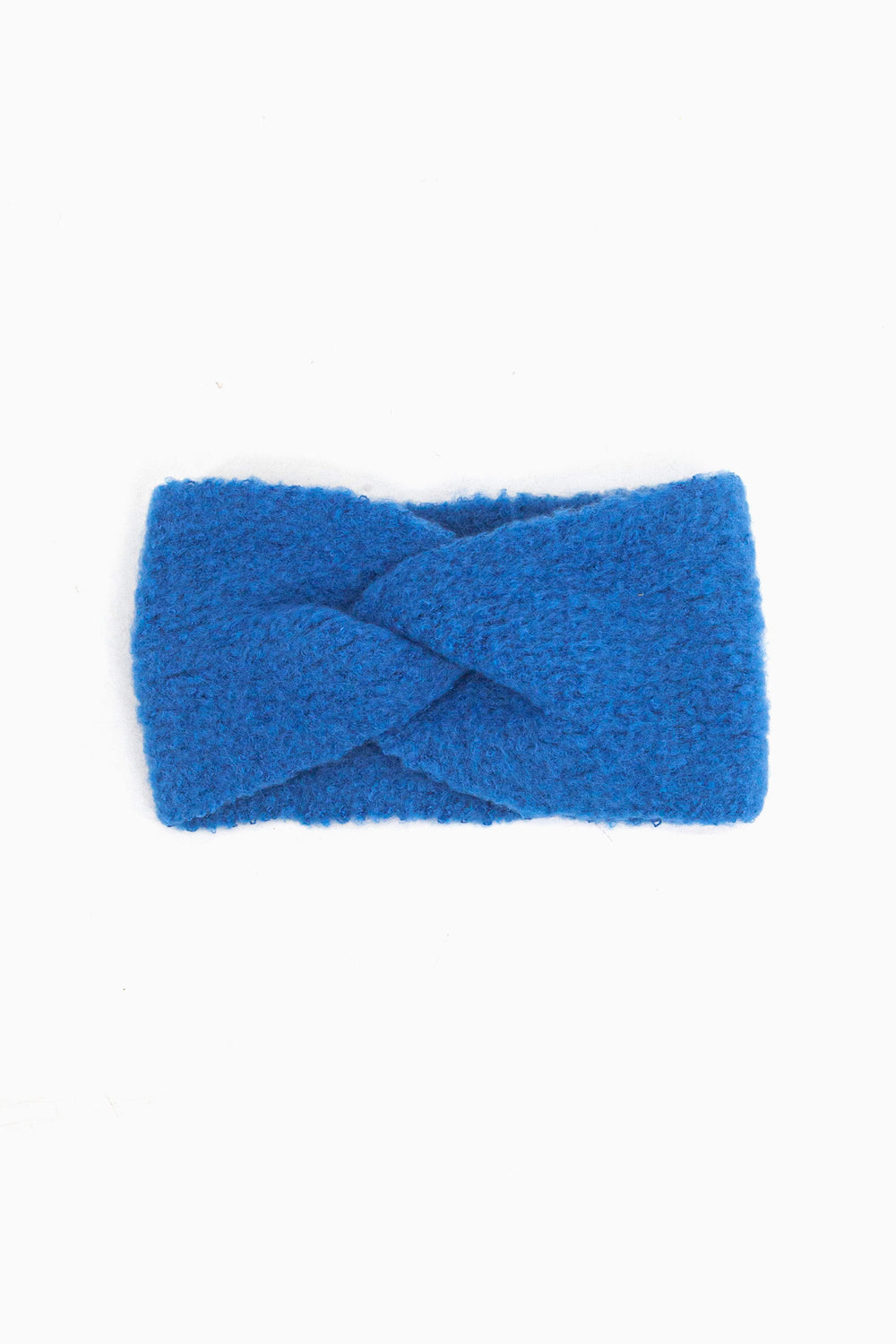 knitted royal blue twist front head band laying flat