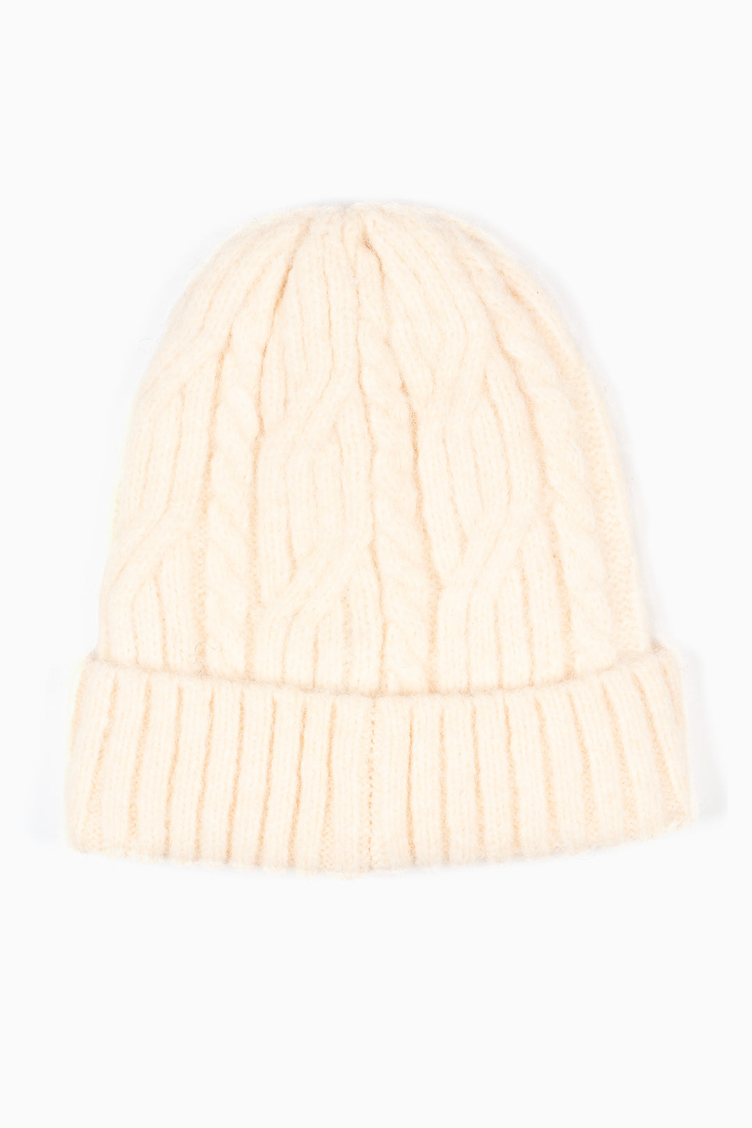 showing the cream beanie hat laying flat, the bold cable knit design is shown, the hat also has a ribbed brim.