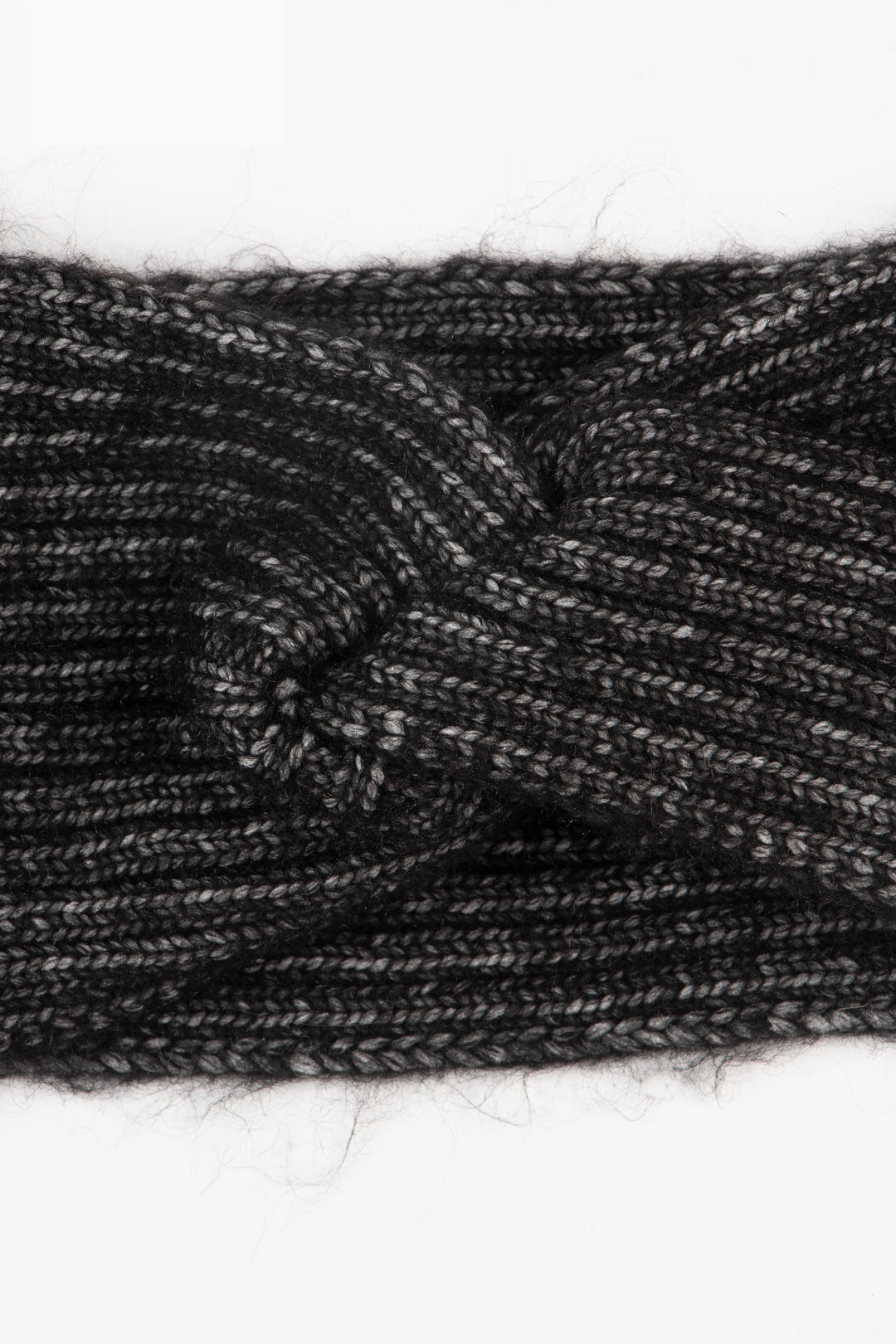 close up of the ribbed knitted material and of the twisted knot front design.