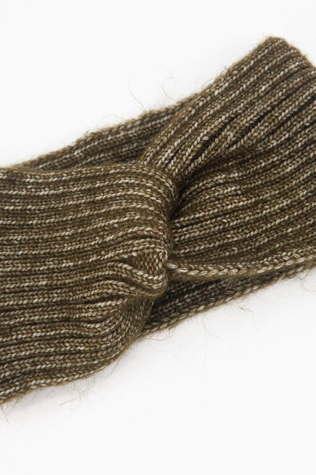 close up of the ribbed knitted material and of the twisted knot front design.