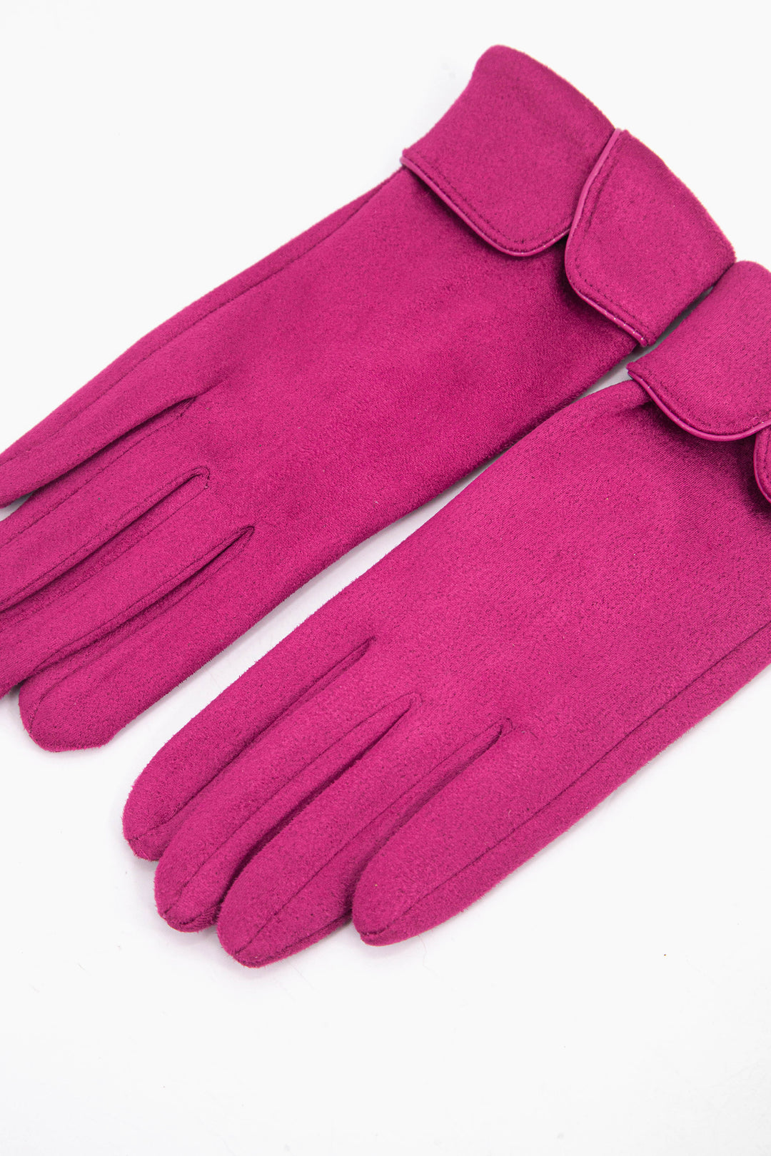 pink velvet winter gloves with scalloped fold over cuffs.