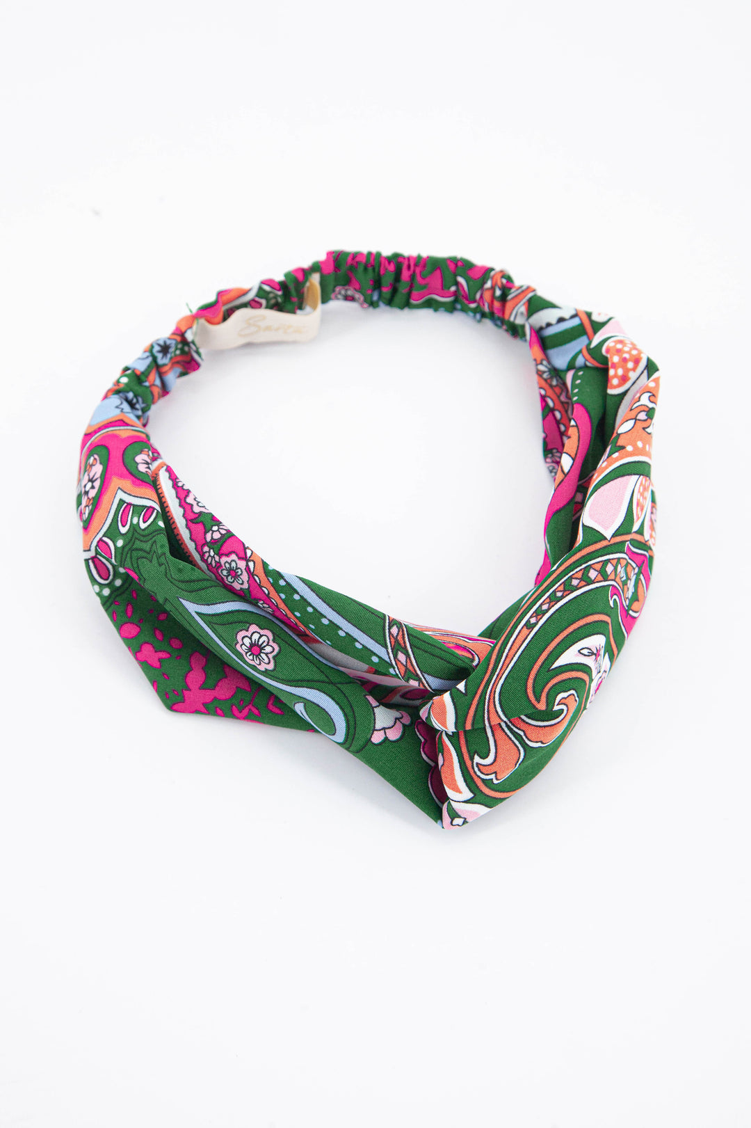 green and pink paisley print fabric twist front headband