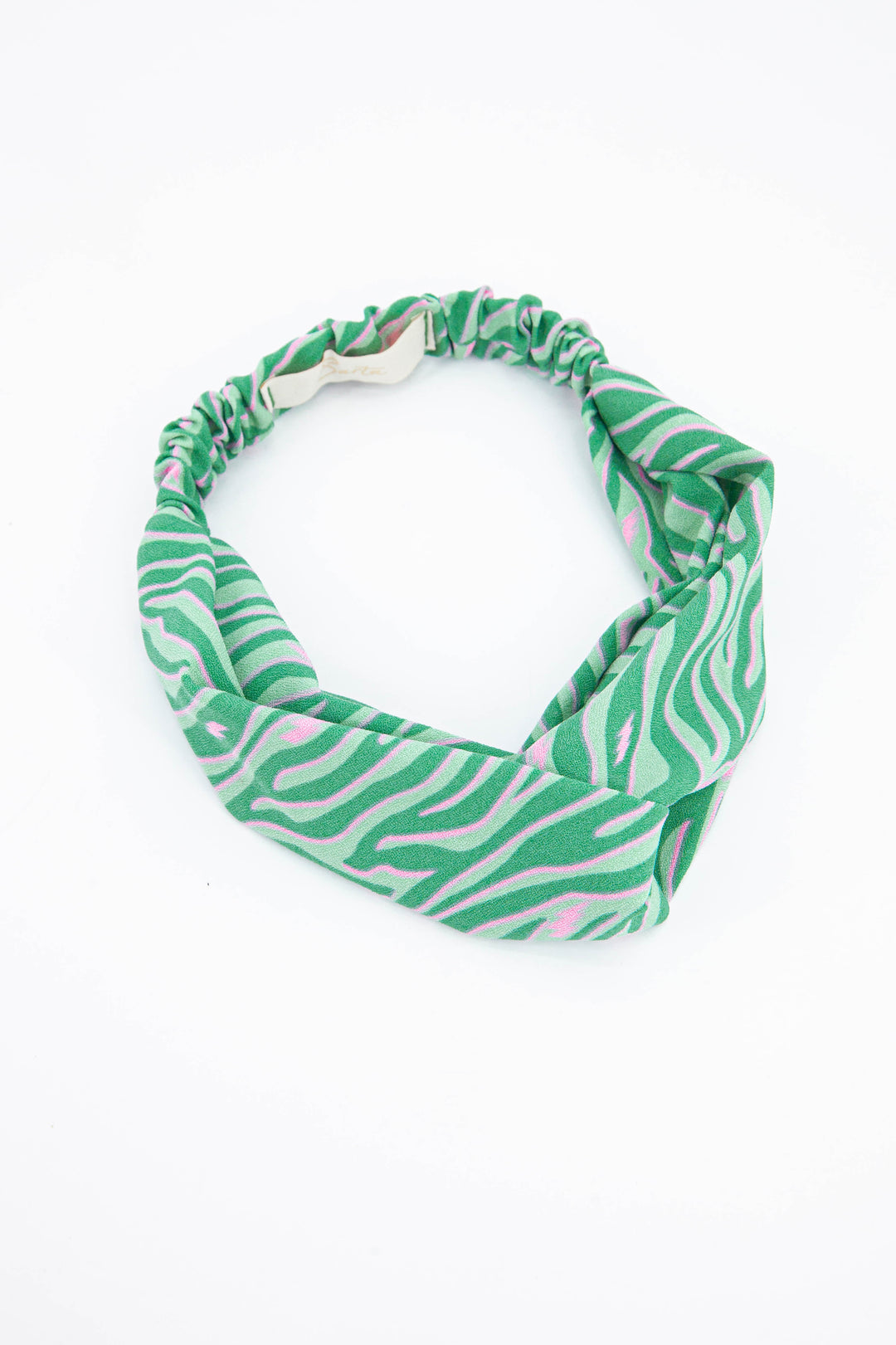 green and pink zebra print fabric head band with twisted front and elasticated back