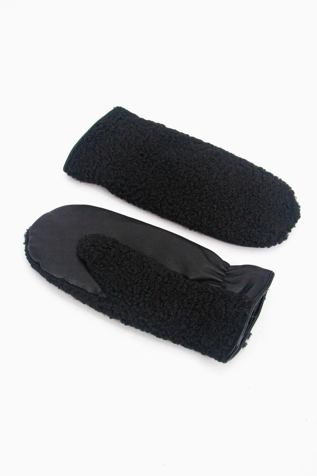 showing the fleece mittens laying flat, one is palm up the other palm down. the fleece is only on the back of the glove, the palm is made from polyester.