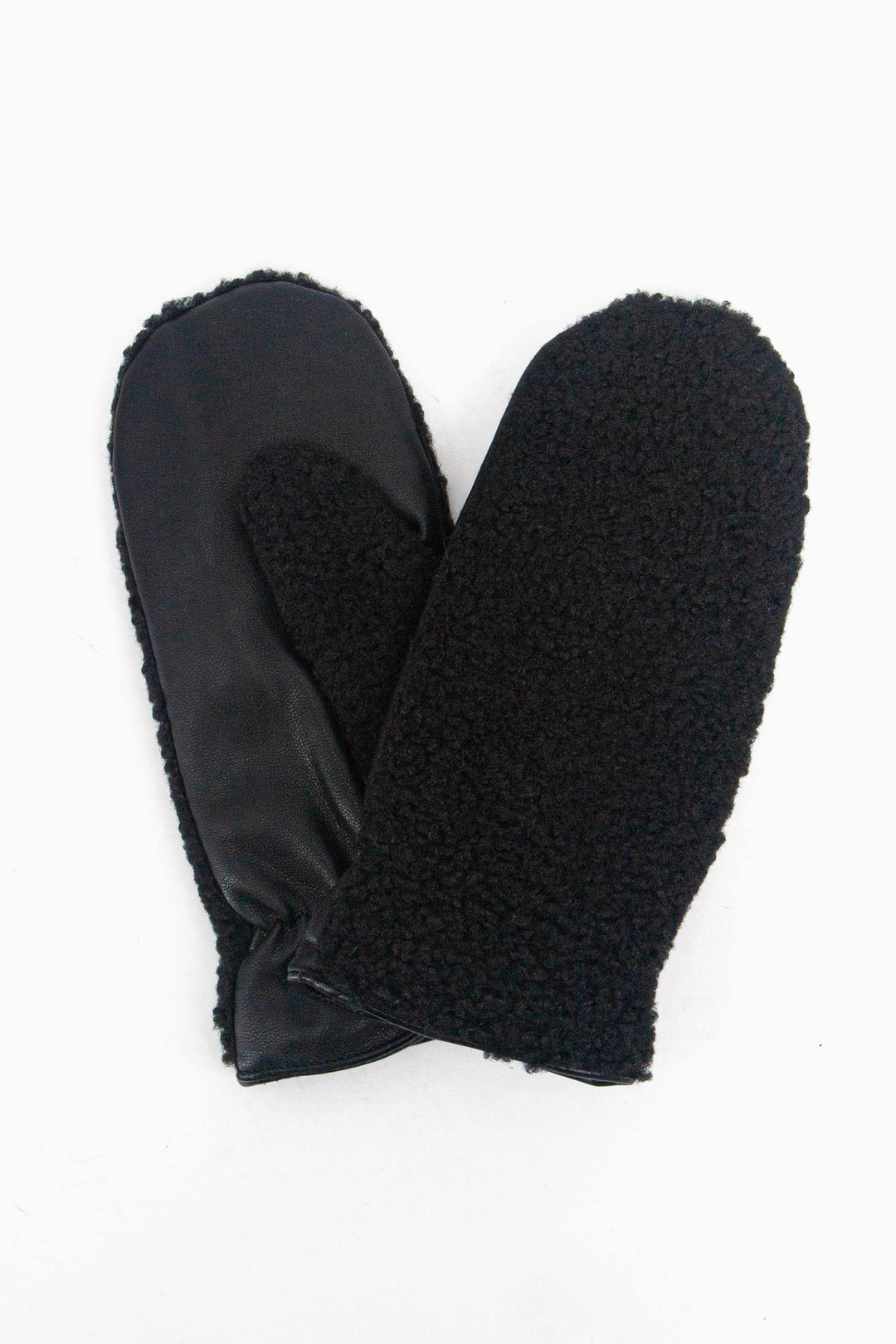 showing the gloves close up, the trim around the edge of the cuffs is polyester. 