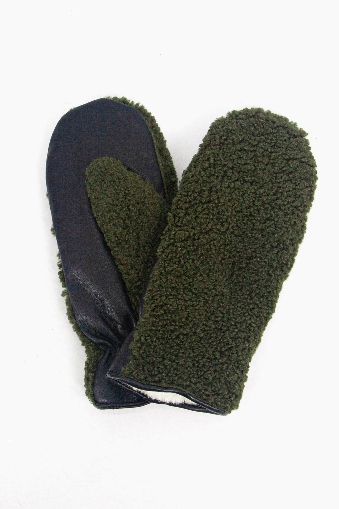 showing the gloves close up, there is an inner lining which is white, the trim around the edge of the cuffs is polyester. 