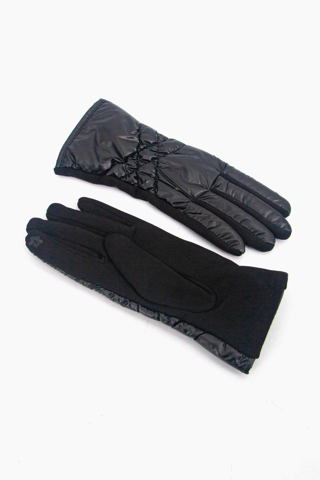 showing the palm and the back of the gloves, the inner index finger has an embroidered flower on the finger tip, this is to allow the wearer to use a touch screen device when wearing the gloves.