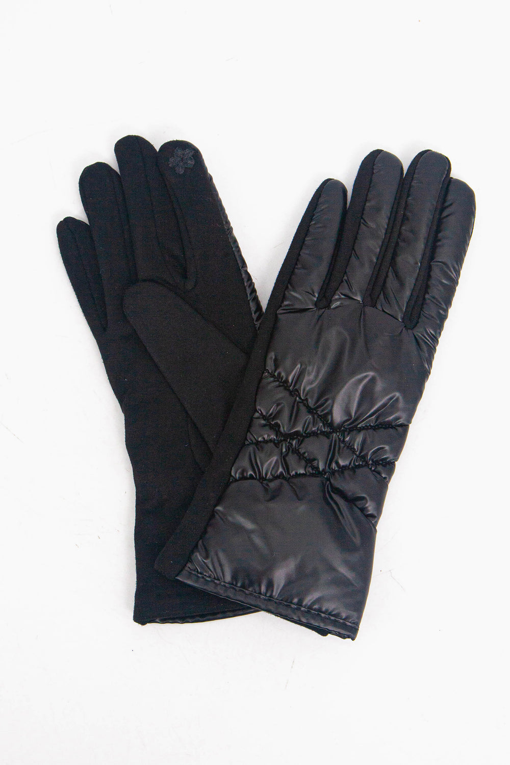 a close up of the black metallic winter gloves showing up close the stitched design on the back of the glove.