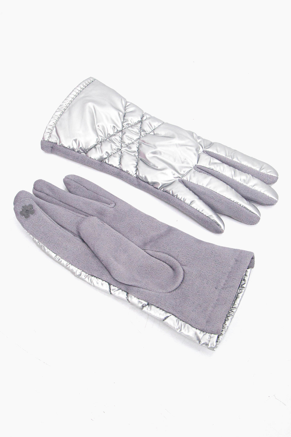 showing the palm and the back of the gloves, the inner index finger has an embroidered flower on the finger tip, this is to allow the wearer to use a touch screen device when wearing the gloves.