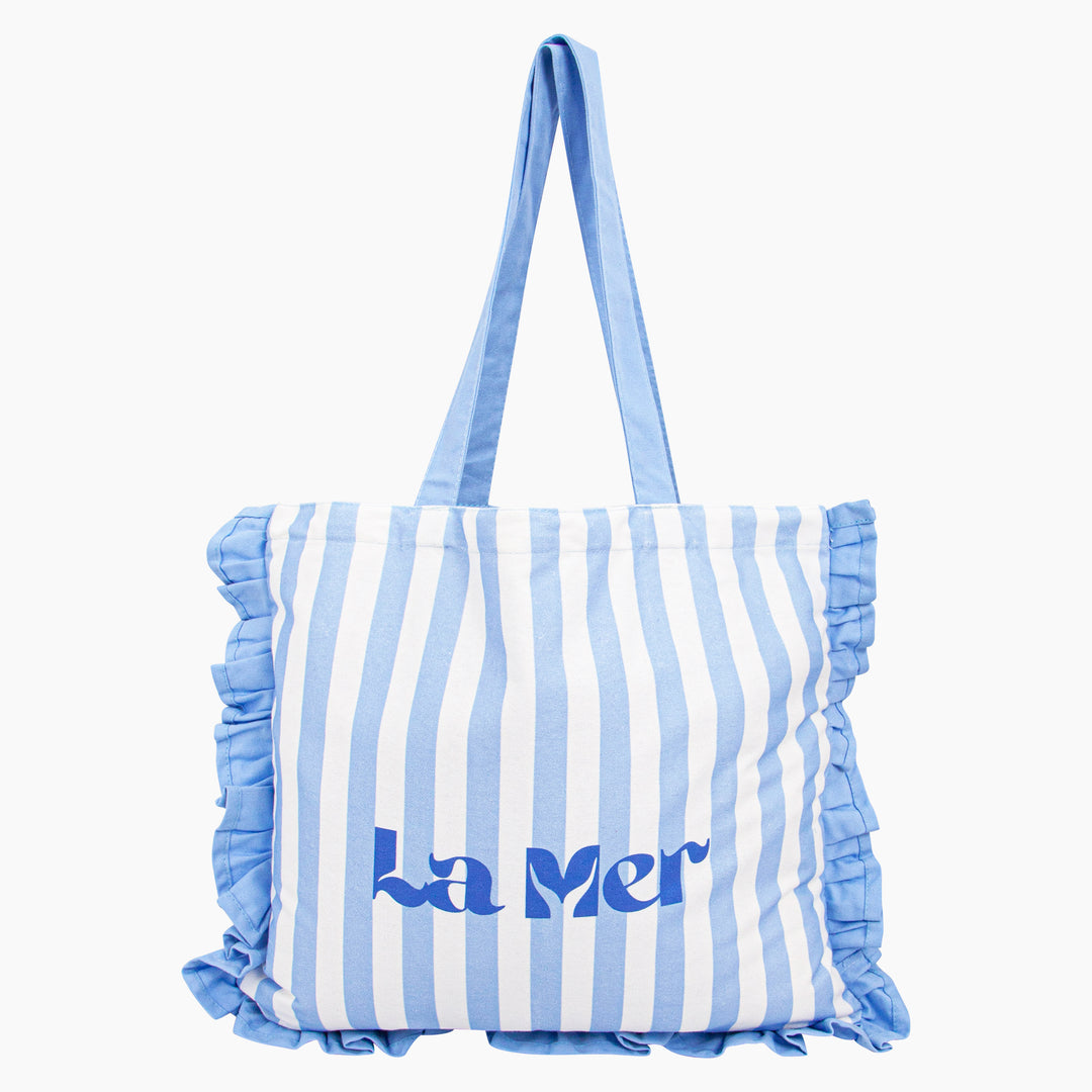 La-Mer-Striped-Frilled-Canvas-Tote-Bag-in-Blue-front
