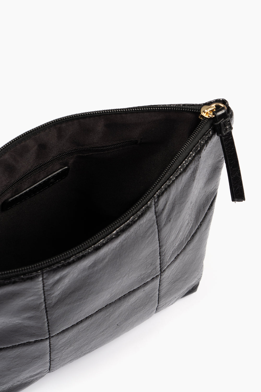 showing the vanity  from above the bag is unzipped and shows one internal compartment