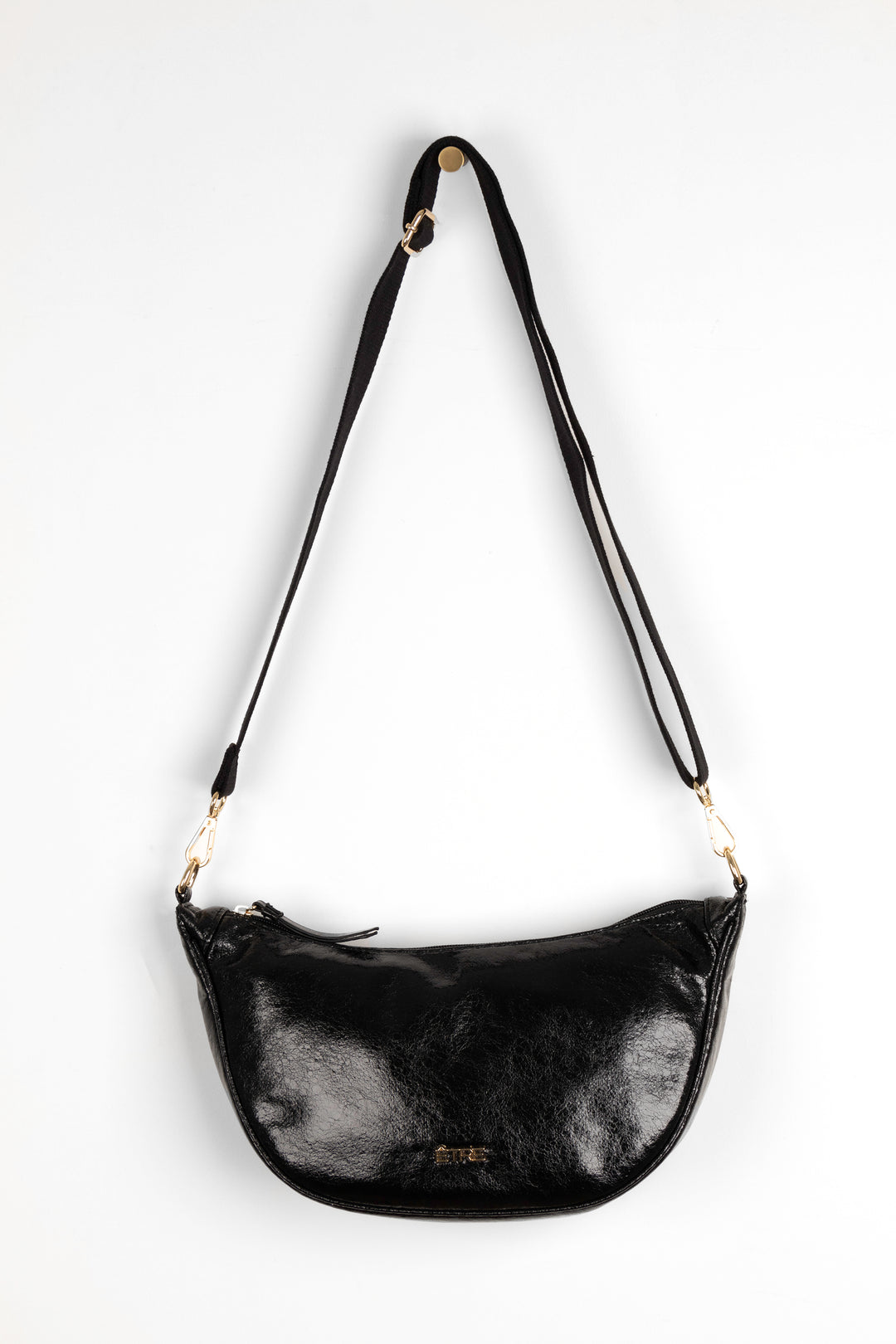 faux cracked leather metallic black half moon crossbody bag with a black canvas detachable strap