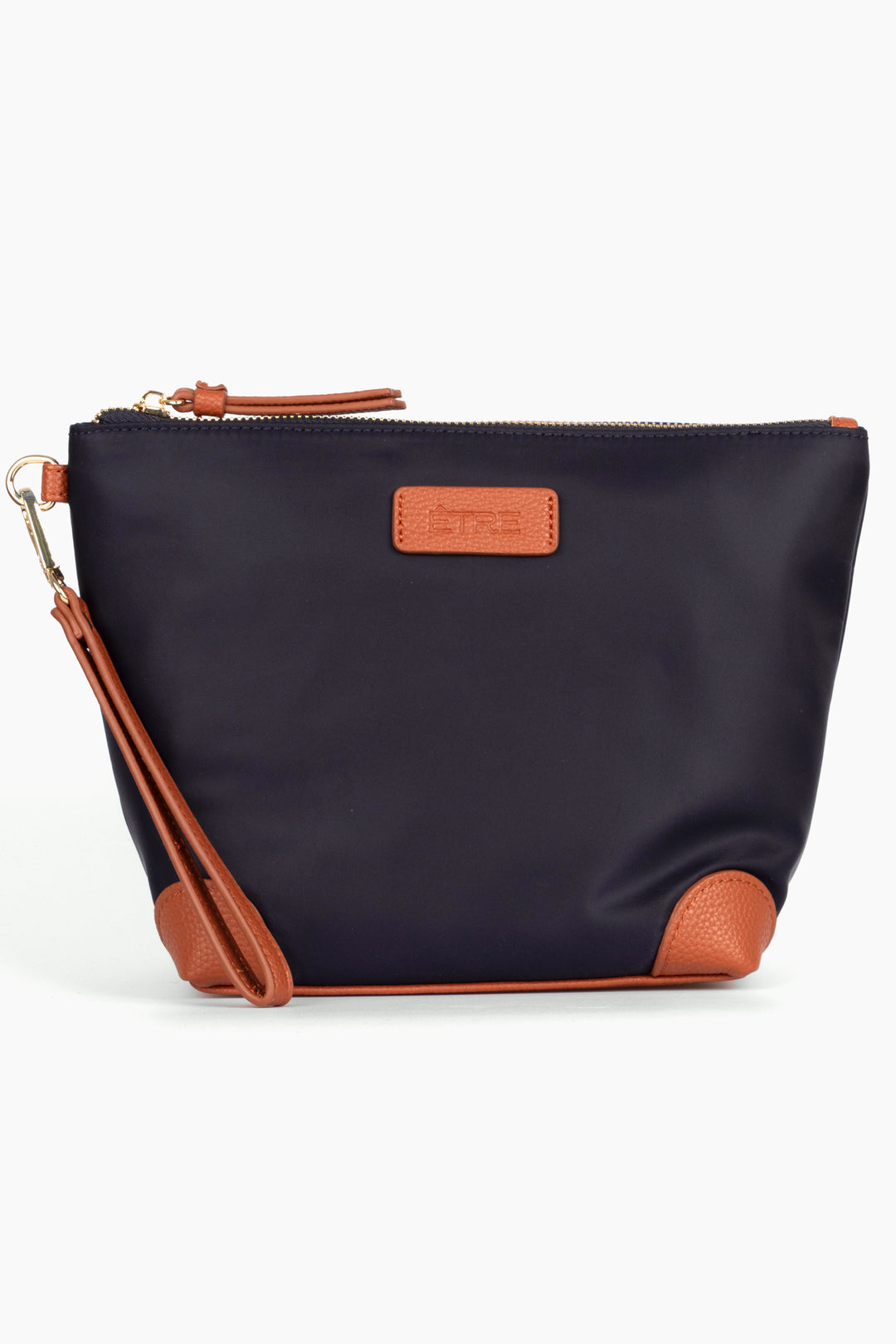 navy blue vanity bag with tan pleather accents and detachable wrist strap