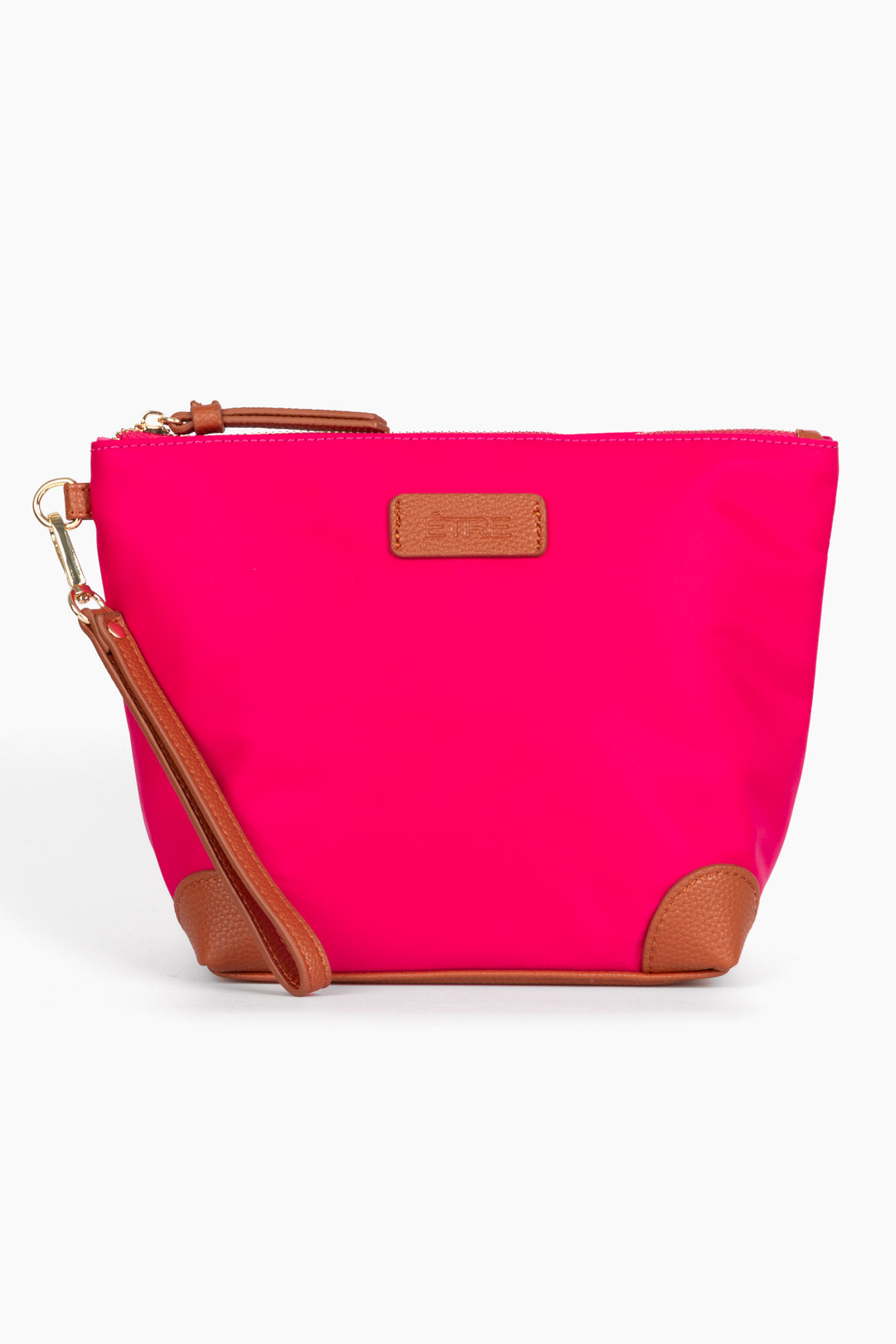 bright pink vanity bag with tan pleather accents and detachable wrist strap