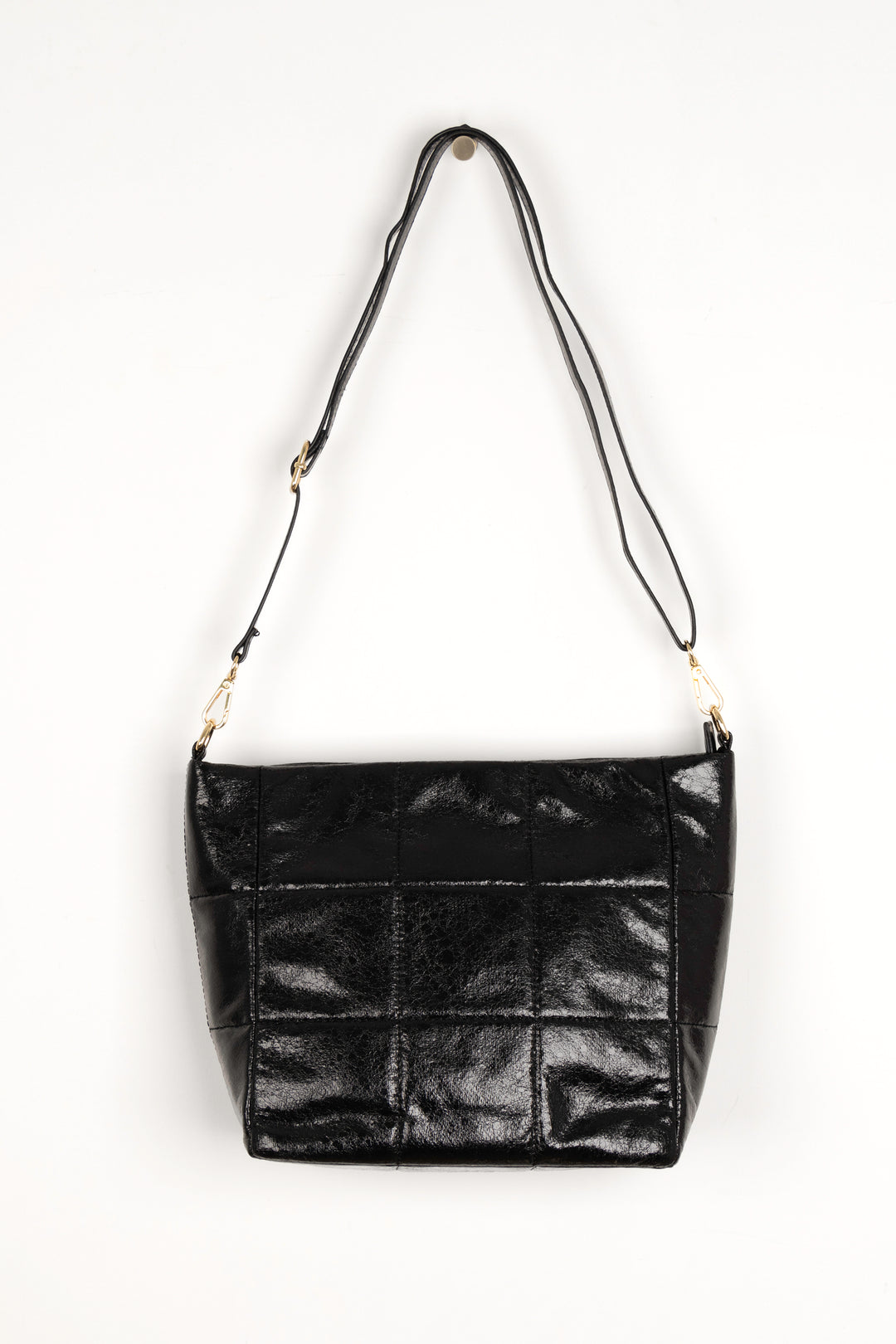 black cracked faux leather mid size crossbody bag with detachable bag strap and gold hardware