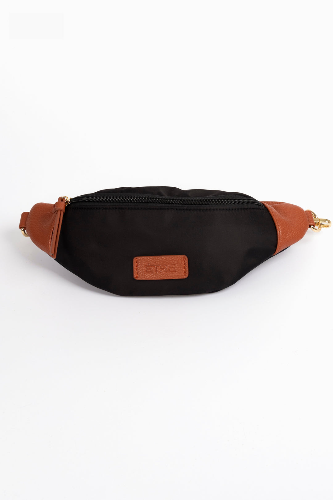 black nylon bum bag with tan faux leather accents, the bag is zip closing and has gold hardware