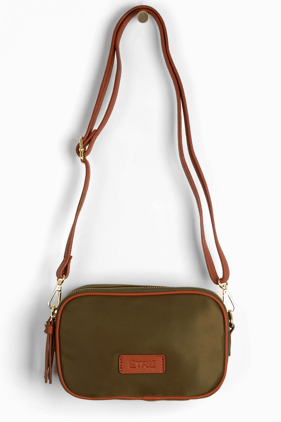 khaki crossbody bag with tan faux leather accents and a detachable strap