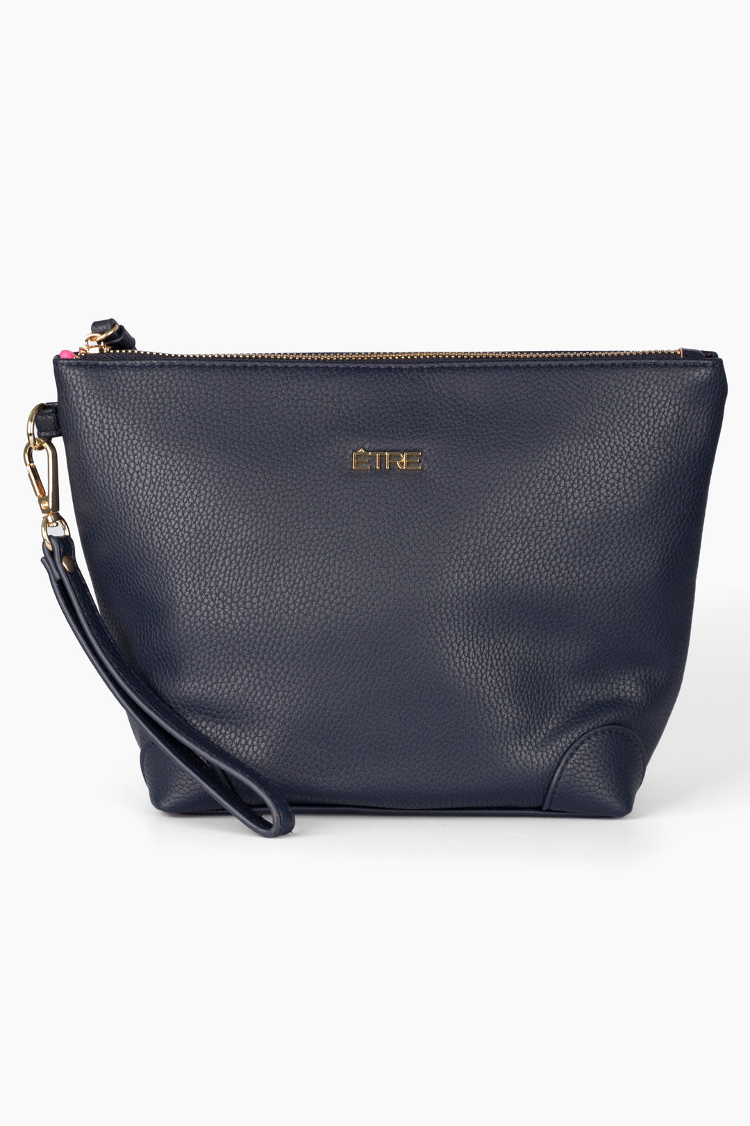 navy blue faux leather vanity bag with a detachable wrist strap and top zip closure