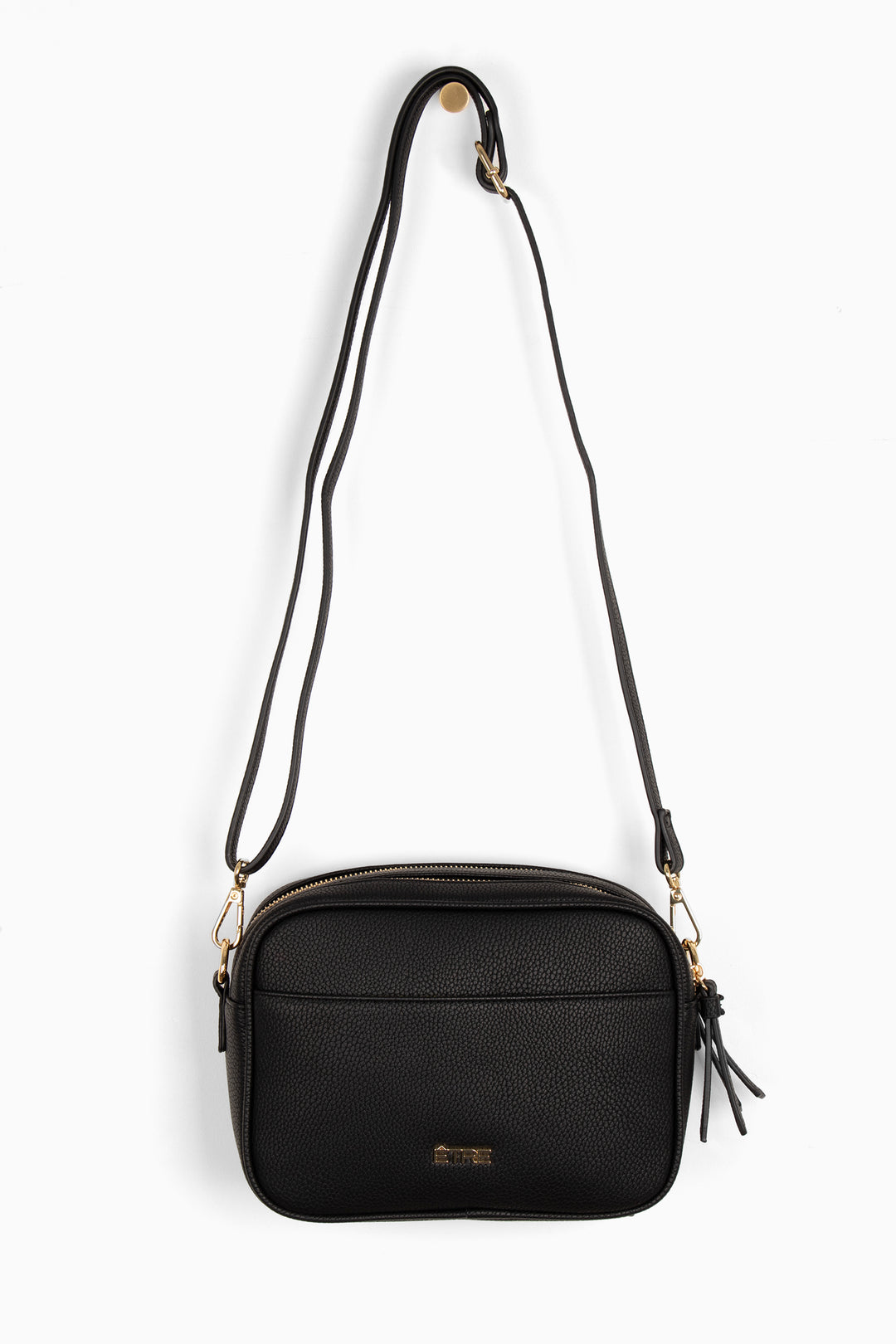 black pebbled faux leather crossbody bag with detachable bag strap and gold hardware