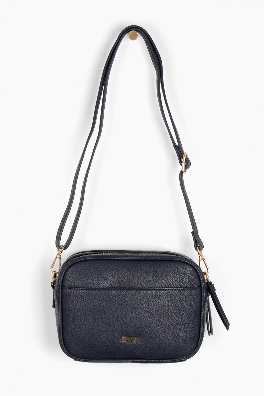 navy blue pebbled faux leather crossbody bag with detachable bag strap and gold hardware