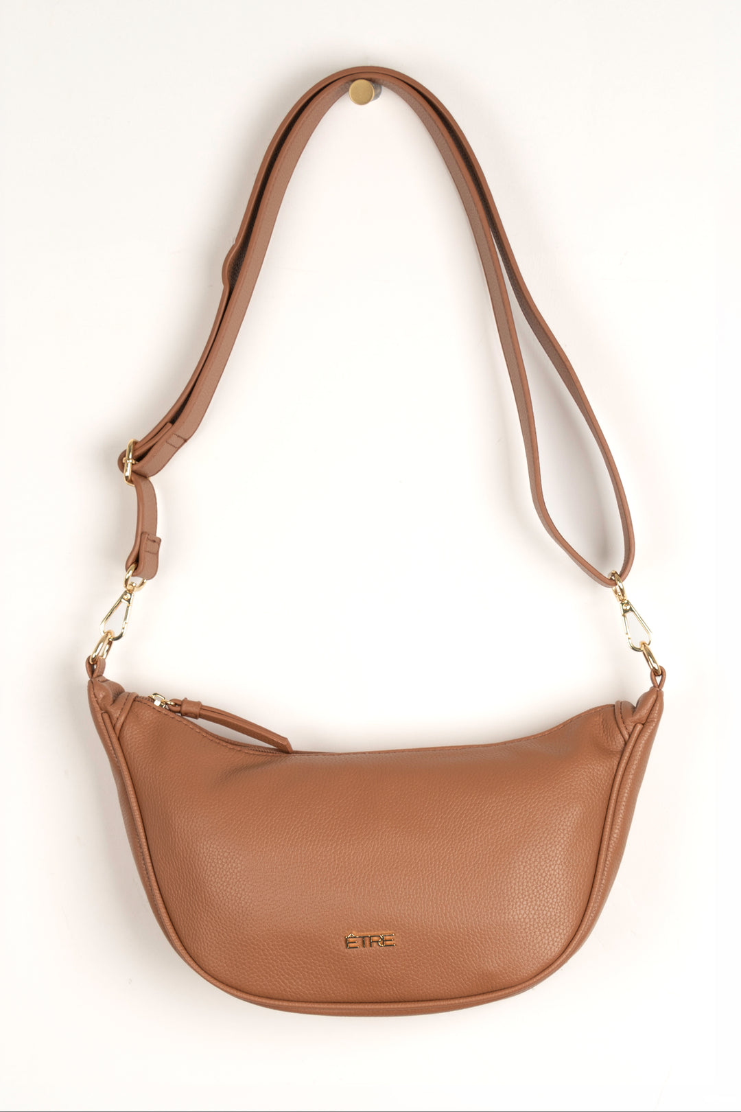 tan brown faux leather crossbody half moon sling bag with detachable bag strap