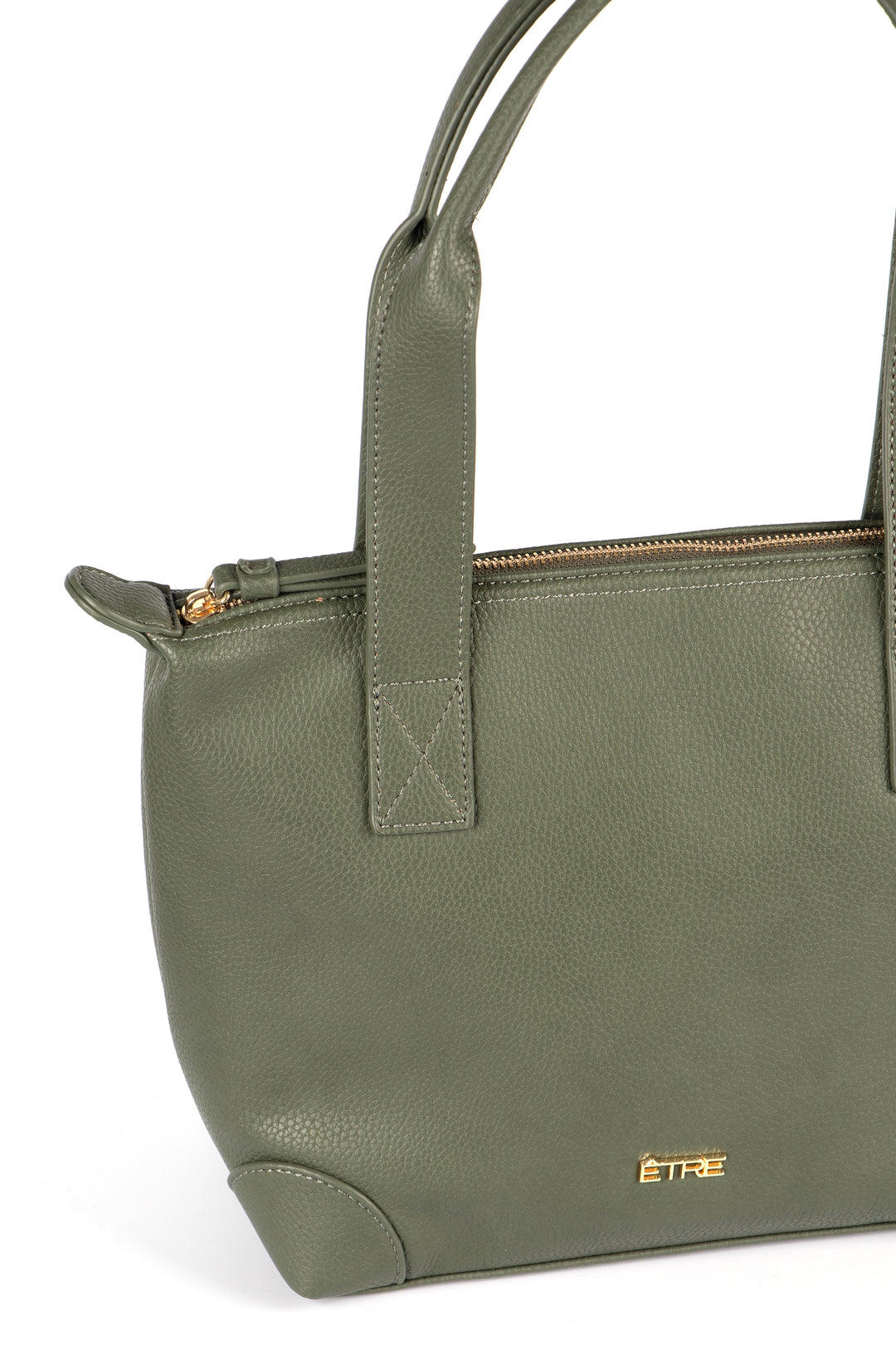 close up of the top of the bag, showing clearly the gold zip closure main compartment and carry handles on the top.