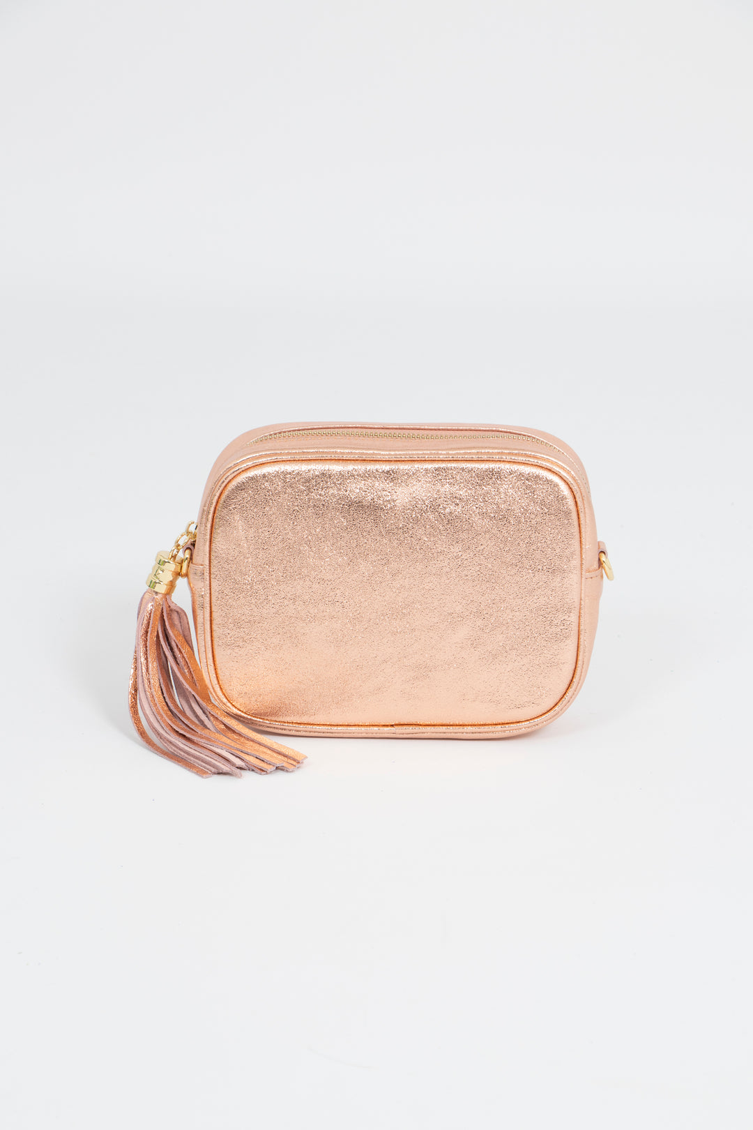 rose gold metallic leather crossbody camera bag with a detachable bag strap and gold hardware