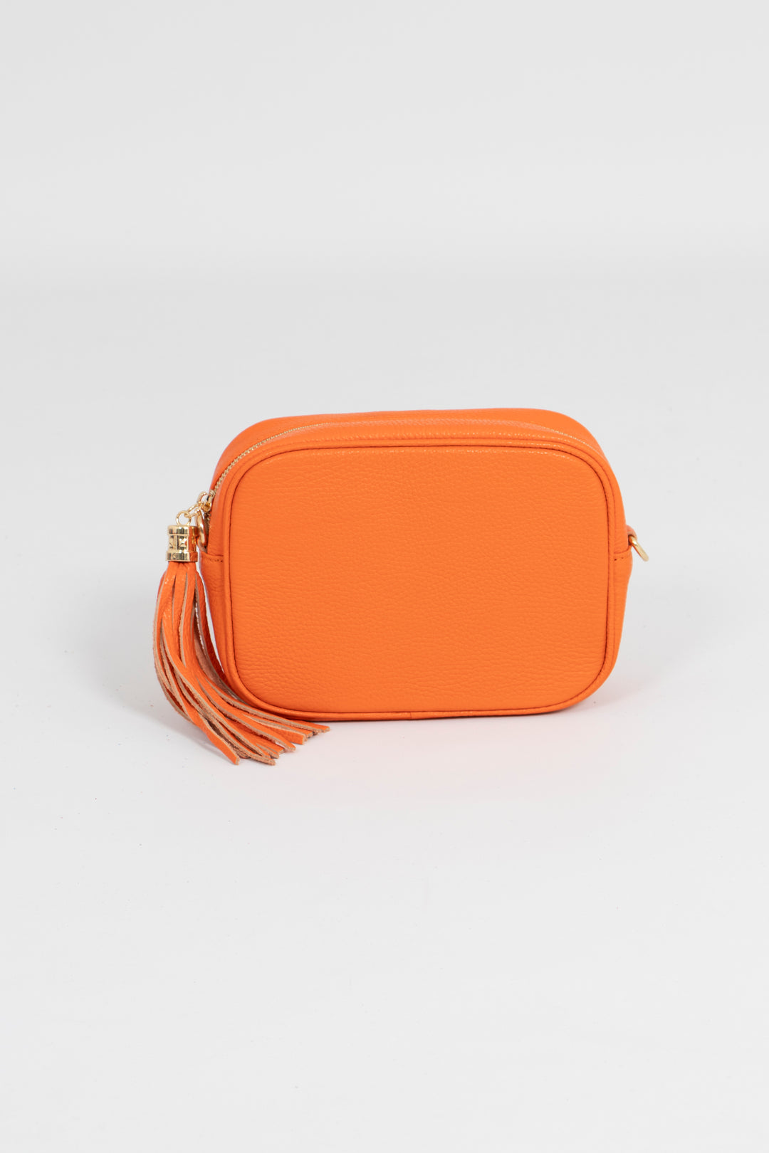 pebbled orange leather crossbody camera bag with detachable bag strap and gold hardware