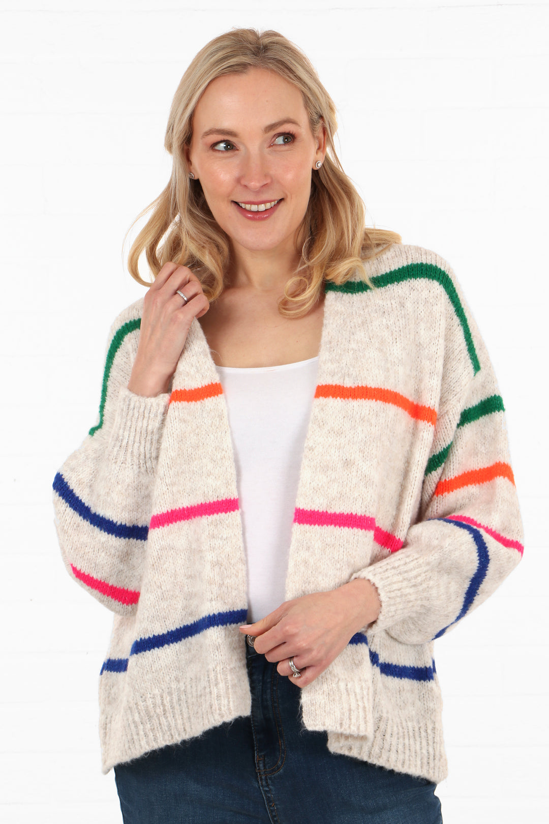 cream knitted cardigan with horizontal stripes in green, orange, pink and blue